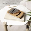 image:imageUmbra Strumba Kalimba Handheld Musical Instrument  Wooden body comfortable grip unique handcrafted appearance