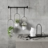 image:imageUmbra Triflora Hanging Planter Indoor Herb Garden Set of 3 WhiteBlack  Extendable metal rod adjustable rope lengths fits standard pots wall or ceiling mount holds 15 lbs recycled plasticWhiteBlack