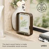 image:imageUmbra Bellwood 5x7 Desk Picture Frame with Bent Wood Trim and TwoSided Rotating Display Natural  Beech wood 360 degree pivot two photo display portrait or landscape wipe cleanAged Walnut