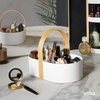 image:imageUmbra Bellwood Makeup Organizer with Handle Large WhiteNatural  Three tier capacity removable brush cup integrated carry design vanity countertop use sixty percent recycled plasticWhiteNatural