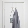 image:imageUmbra Buddy Over Door Hook Space Saving Cabinet Set of 2 White  Nonslip rubber tips EVA foam padding installs without tools protects surfaces towel storage solution recycled plasticWhite