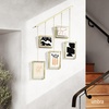 image:imageUmbra Exhibit Picture Frame Set Adjustable Wall Mount Set of 5 Brass  Steel construction customizable layout damagefree hanging fits 4x6 and 5x7 photos includes mounting hardwarePack of 5