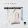 image:imageUmbra Flip Coat Rack Wall Mount 8Hook Space Saving White  Real wood and steel build retractable hooks fold flat holds coats bags and scarves easy installGreyPewter