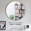 image:imageUmbra Hubba Round Wall Mirror Circle Decor Mirror 34Inch Brass  Metallic frame glass construction reflects light to brighten enlarges small rooms
