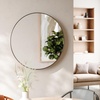 image:imageUmbra Hubba Round Wall Mirror Circle Decor Mirror 34Inch Titanium  Metallic frame glass construction reflects light to brighten enlarges small rooms
