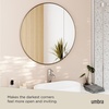 image:imageUmbra Hubba Round Wall Mirror Circle Decor Mirror 34Inch Titanium  Metallic frame glass construction reflects light to brighten enlarges small rooms