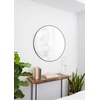 image:imageUmbra Hubba Round Wall Mirror Circle Decor Mirror 34Inch Titanium  Metallic frame glass construction reflects light to brighten enlarges small rooms