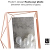image:imageUmbra Prisma Picture Frame Floating Metal Wall Mount 5x7 Brass  Steel wire construction unique geometric shape displays photo between glass desk or tabletop use hardware includedCopper