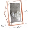 image:imageUmbra Prisma Picture Frame Floating Metal Wall Mount 5x7 Brass  Steel wire construction unique geometric shape displays photo between glass desk or tabletop use hardware includedCopper