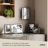image:imageUmbra Prisma Picture Frame Floating Metal Wall Mount 5x7 Brass  Steel wire construction unique geometric shape displays photo between glass desk or tabletop use hardware includedBlack