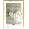 image:imageUmbra Prisma Picture Frame Floating Metal Wall Mount 5x7 Brass  Steel wire construction unique geometric shape displays photo between glass desk or tabletop use hardware includedBrass
