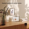 image:imageUmbra Prisma Picture Frame Floating Metal Wall Mount 5x7 Brass  Steel wire construction unique geometric shape displays photo between glass desk or tabletop use hardware includedChrome