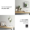 image:imageUmbra Prisma Picture Frame Floating Metal Wall Mount 5x7 Brass  Steel wire construction unique geometric shape displays photo between glass desk or tabletop use hardware includedcromado