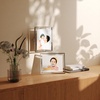 image:imageUmbra Prisma Picture Frame Floating Metal Wall Mount 5x7 Brass  Steel wire construction unique geometric shape displays photo between glass desk or tabletop use hardware includedChrome