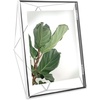 image:imageUmbra Prisma Picture Frame Floating Metal Wall Mount 5x7 Brass  Steel wire construction unique geometric shape displays photo between glass desk or tabletop use hardware includedChrome