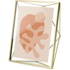 image:imageUmbra Prisma Picture Frame Floating Metal Wall Mount 5x7 Brass  Steel wire construction unique geometric shape displays photo between glass desk or tabletop use hardware includedBrass