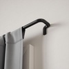 image:imageUmbra Twilight Curtain Rod Wrap Around Blackout 66 to 144 Inches Nickel  Steel supports up to 22 lbs includes all hardware fits grommet and pocket styles adjustable brackets matte finishBlack
