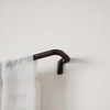 image:imageUmbra Twilight Curtain Rod Wrap Around Blackout 66 to 144 Inches Nickel  Steel supports up to 22 lbs includes all hardware fits grommet and pocket styles adjustable brackets matte finishDark Bronze