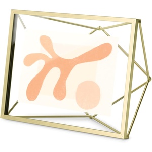 image:imageUmbra Prisma Picture Frame Floating Metal Wall Mount 5x7 Brass  Steel wire construction unique geometric shape displays photo between glass desk or tabletop use hardware includedBrass