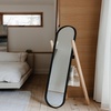 image:imageUmbra Hub Floor Length Mirror with Storage Rack Modern Black Rubber Rim and Solid Wood Storage Ladder BlackNatural Finish