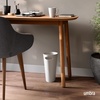 image:imageUmbra Skinny Trash Can  Builtin handle fits narrow openings and odd spaces strong construction easy wipe clean rounded corners