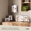 image:imageUmbra Prisma Picture Frame Floating Metal Wall Mount 4x6 Chrome  Steel wire construction unique geometric shape displays photo between glass desk or tabletop use hardware included