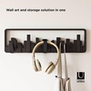 image:imageUmbra Skyline Coat Rack Wall Mounted 5 Retractable Hooks Black  Holds up to five pounds space saving doubles as art includes hardware contemporary style easy install recycled plasticBlack