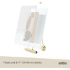image:imageUmbra Flute 5x7 Floating Picture Frame  Modern Glass Photo Frame with Ribbed Backing and Integrated Easel Tabletop Display for Photos or Artwork  Brass