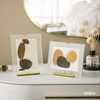 image:imageUmbra Flute 5x7 Floating Picture Frame  Modern Glass Photo Frame with Ribbed Backing and Integrated Easel Tabletop Display for Photos or Artwork  Brass